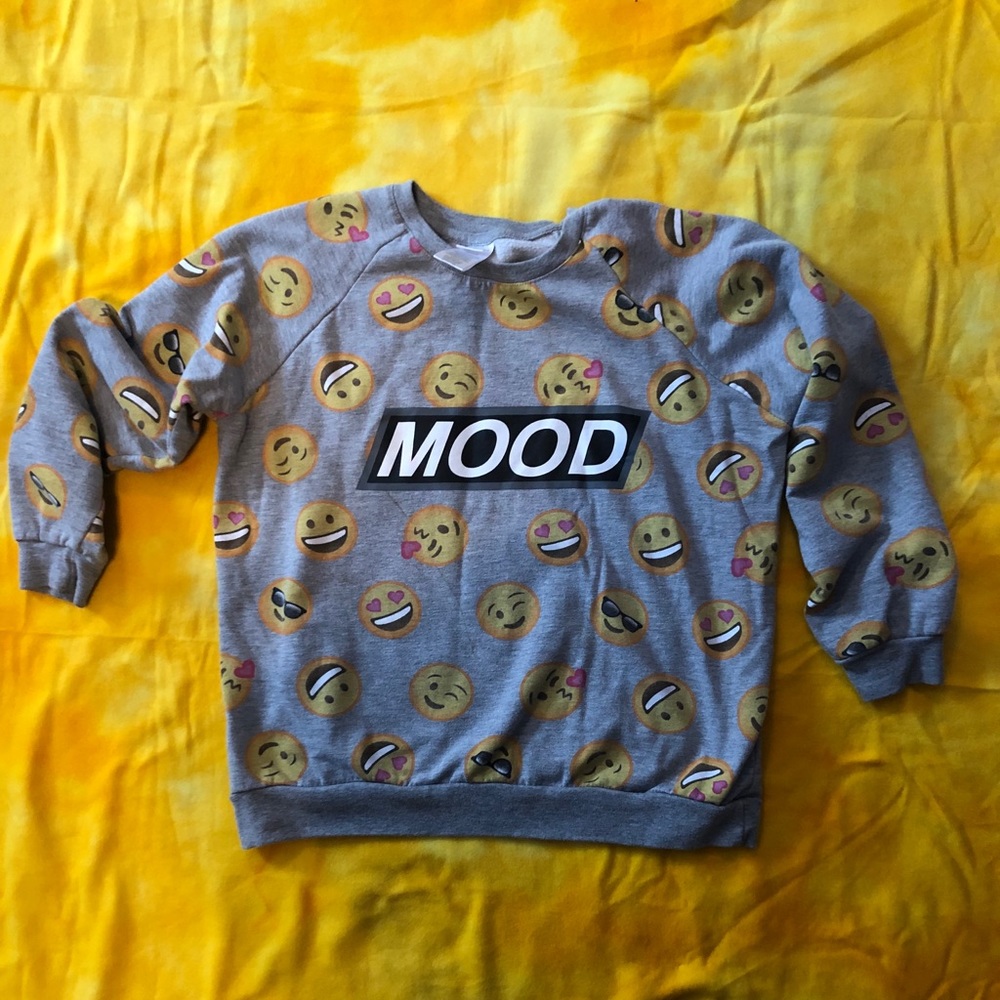 grey sweatshirts that says ‘mood’/emoji pattern
